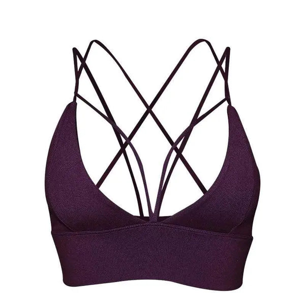 Soutien-gorge de sport violet à bretelles croisées dans le dos.