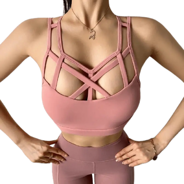 Soutien-gorge de sport rose à bretelles avec un motif croisé sur le devant.