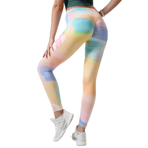 Leggings à motifs tie-dye de couleur pastel, portés sur le bas du corps.