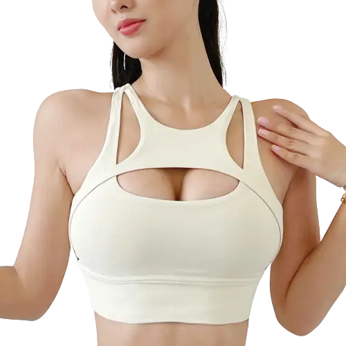 Soutien-gorge de sport blanc avec découpe sur la poitrine.